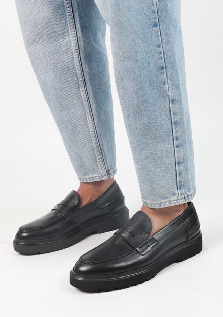 Zwarte loafers met details
