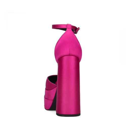 Rosafarbene Pumps mit Plateausohle