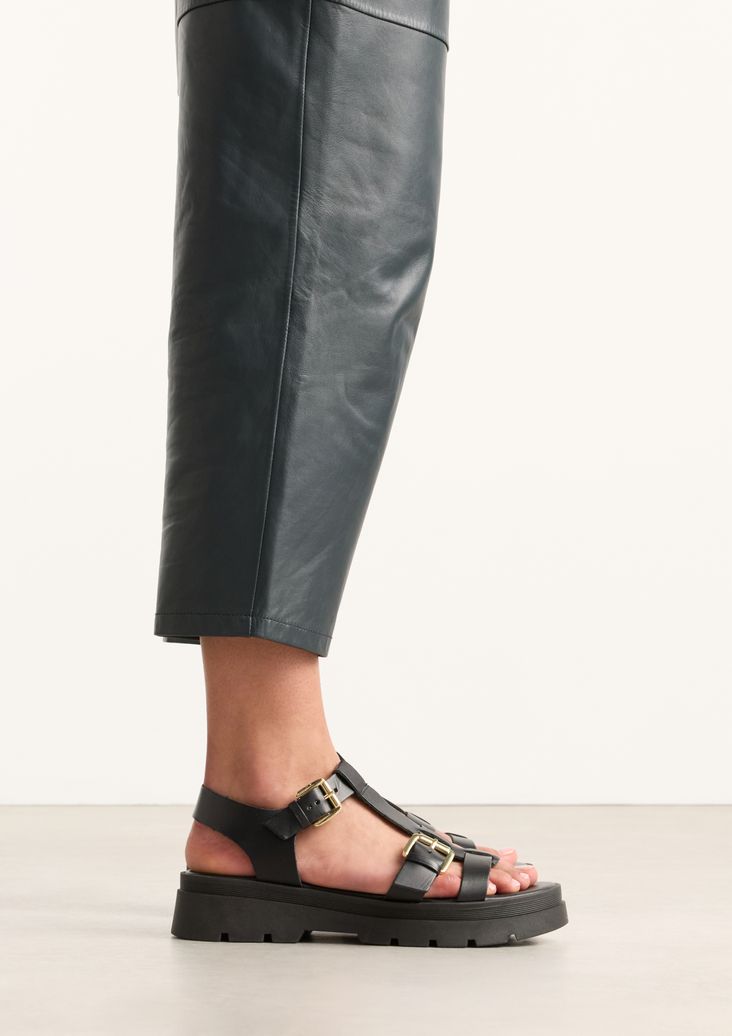 Schwarze Plateausandalen aus Leder