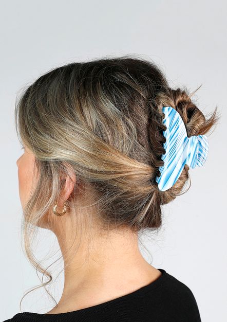 Blauwe haarclip met witte details