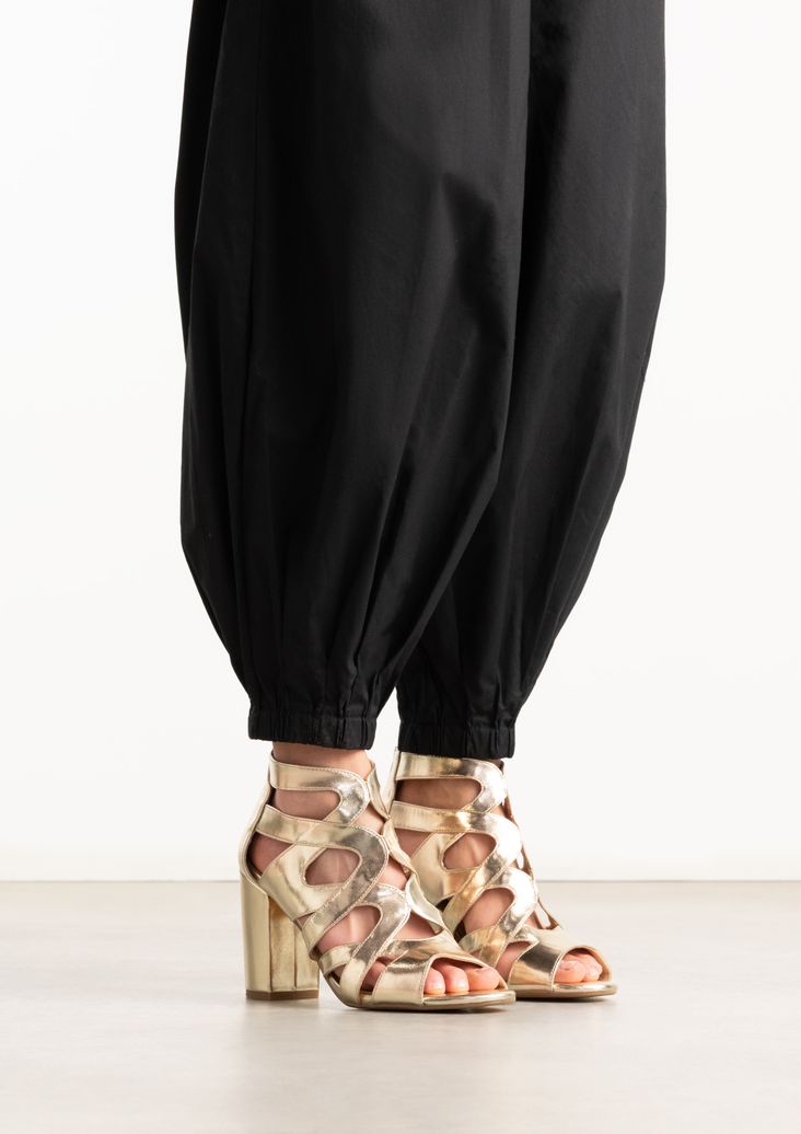 Gouden opengewerkte sandalen met hak