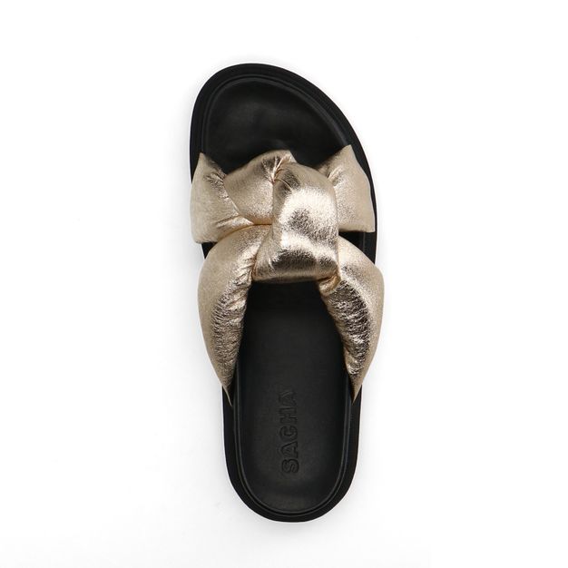 Gouden slippers met knoop detail