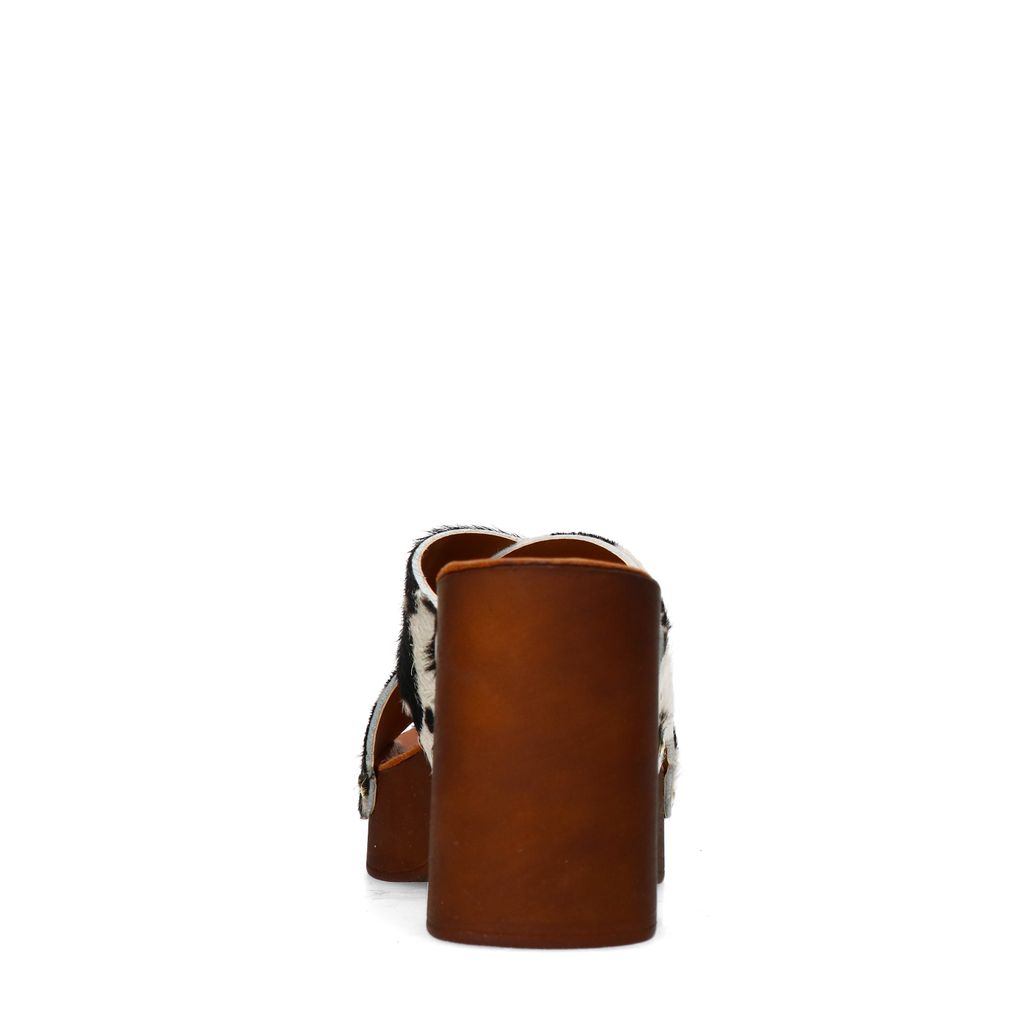 Leder-Mules mit Plateauabsatz und Kuhfellmuster