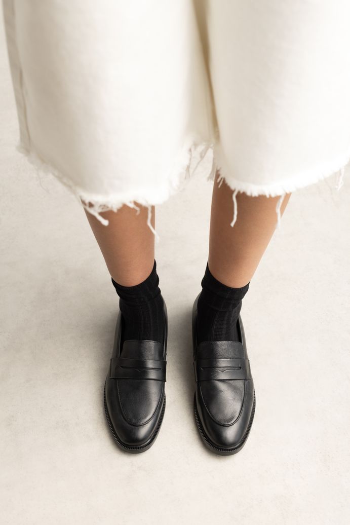Schwarze Penny Loafer aus Leder