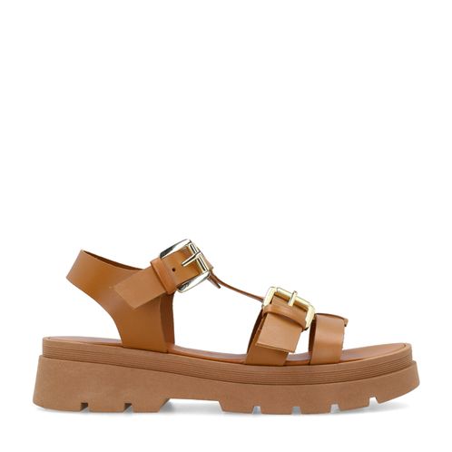 Cognacfarbene Plateausandalen aus Leder mit goldfarbenen Schnallen