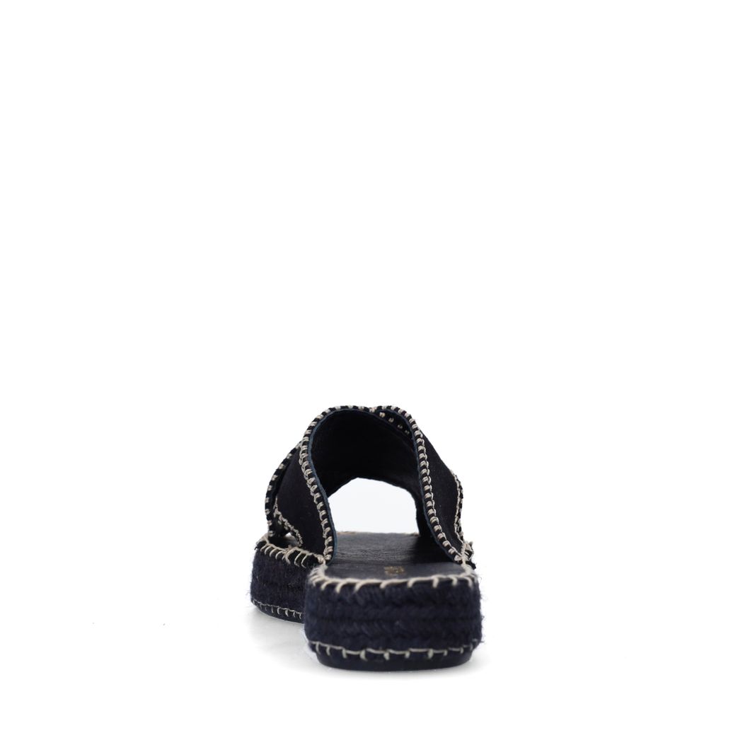 Zwarte suède slippers met witte stiksels