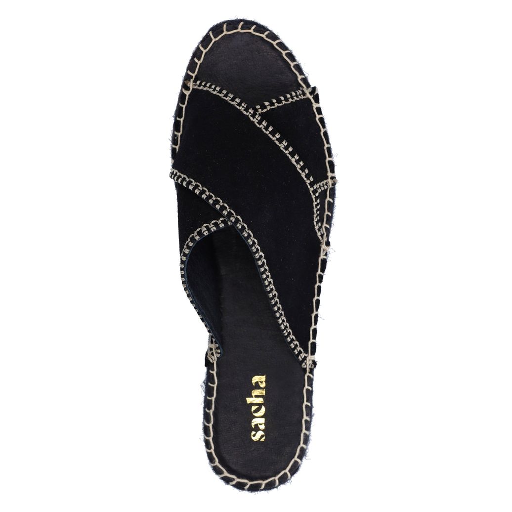 Zwarte suède slippers met witte stiksels