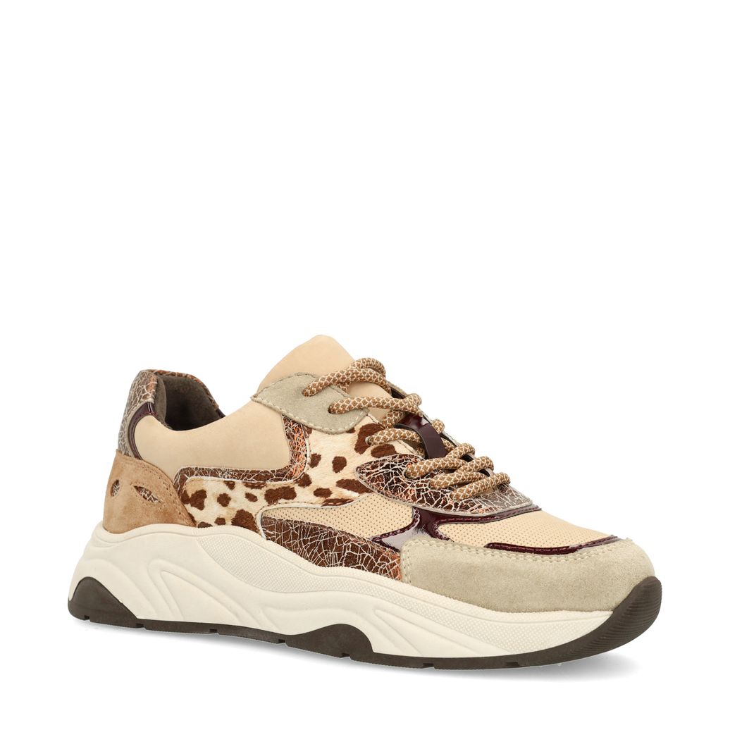 Beigefarbene Sneaker mit Kuhfellmuster