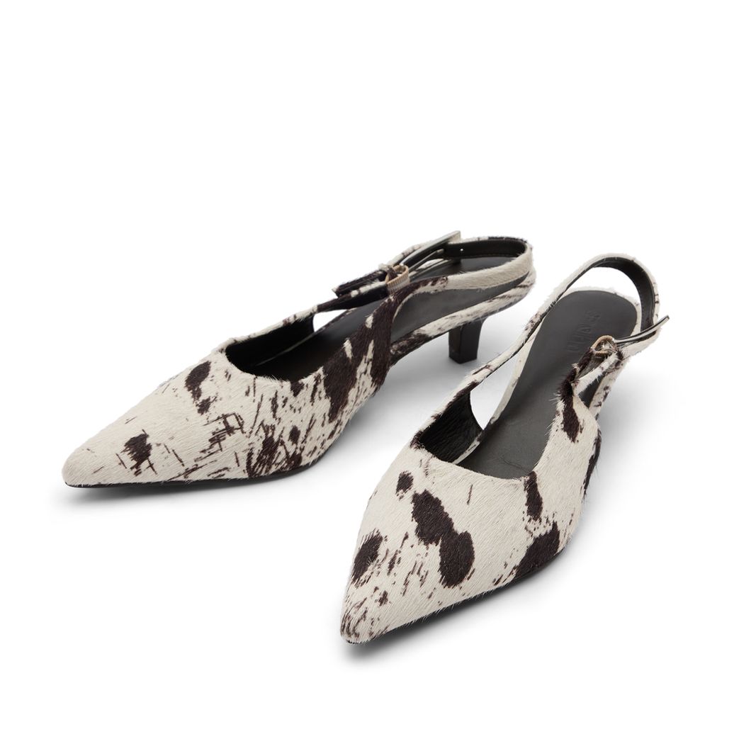 Cow print slingback pumps