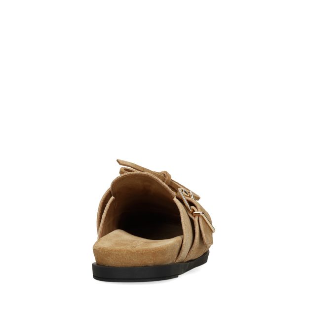 Beige suède clogs met franjes