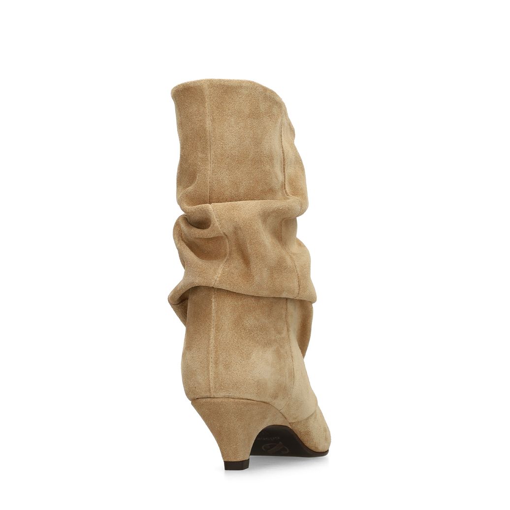 Beigefarbene slouchy Boots aus Veloursleder mit Absatz