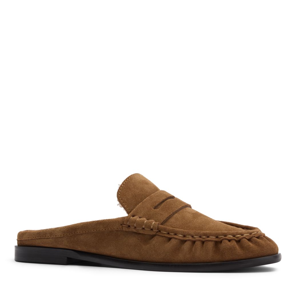 Beige suède instappers met wol